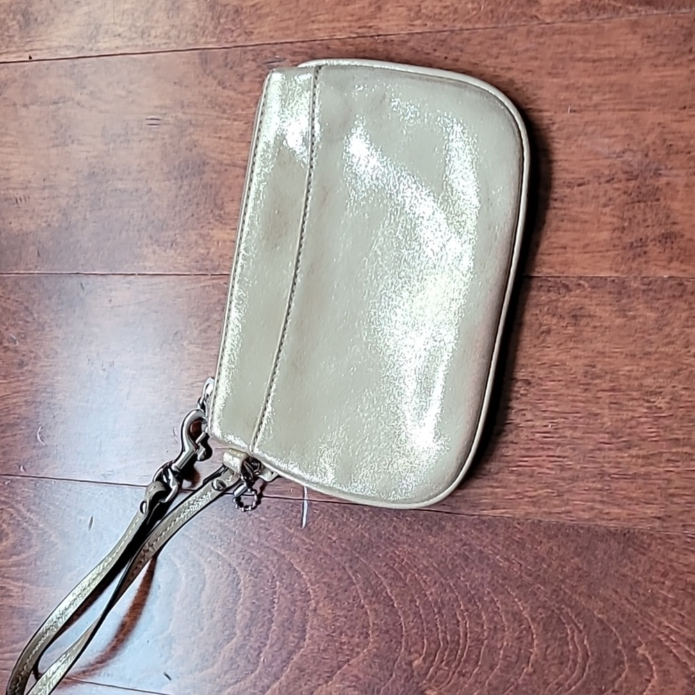 Coach gold shimmer fabric wristlet